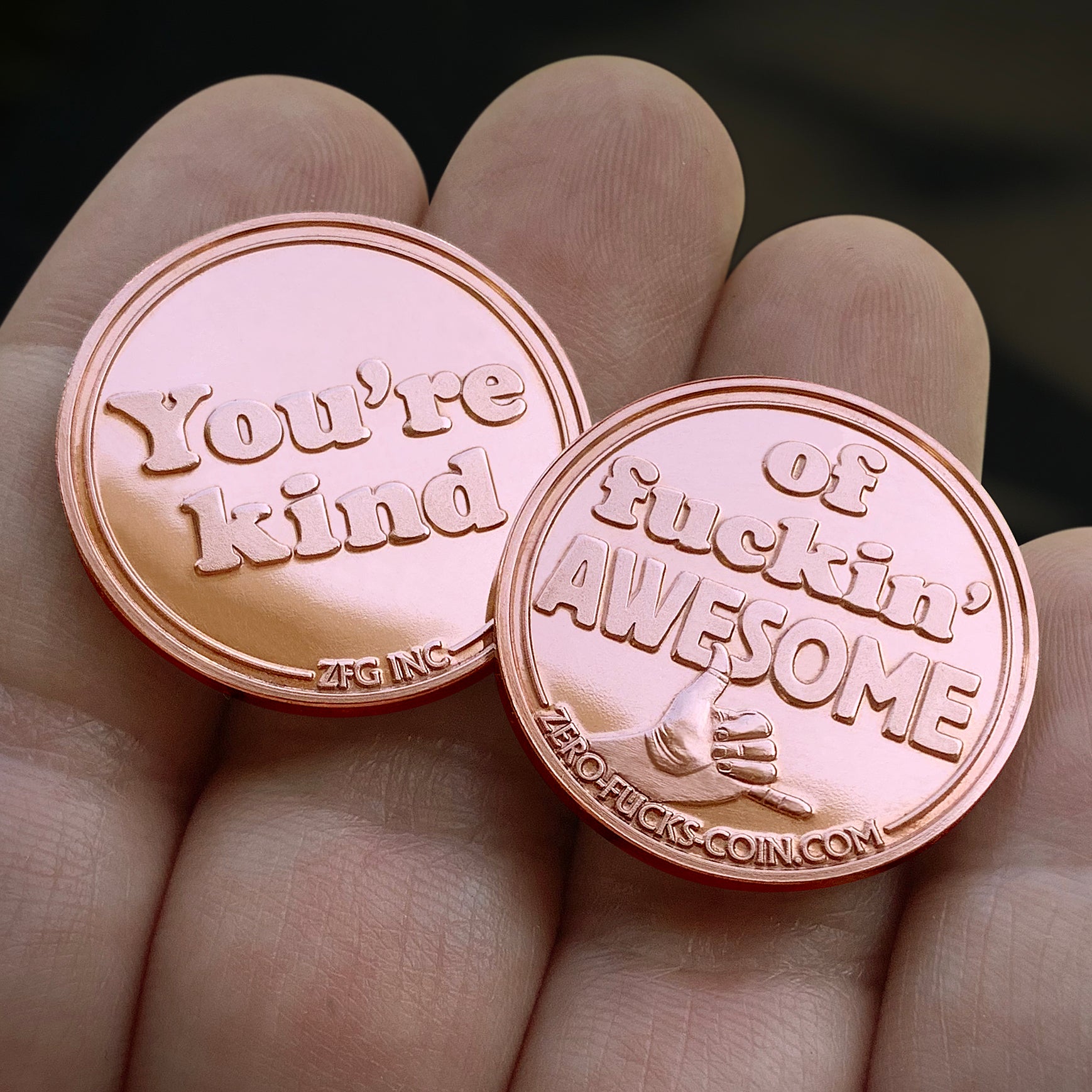 You're kind of awesome coin - 2 coins in hand