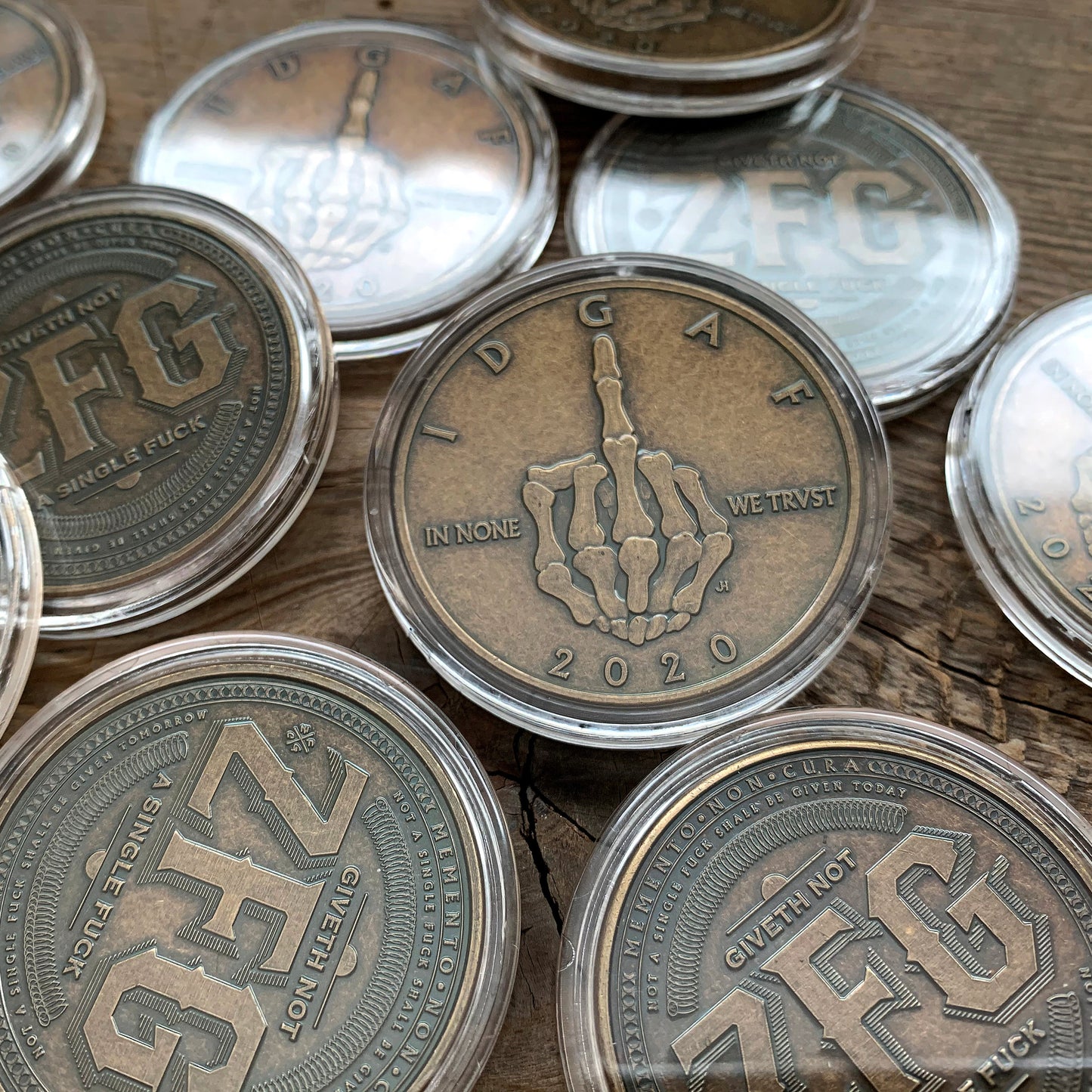 Bronze IDGAF Coins in capsules - skeleton Middle Finger Coin