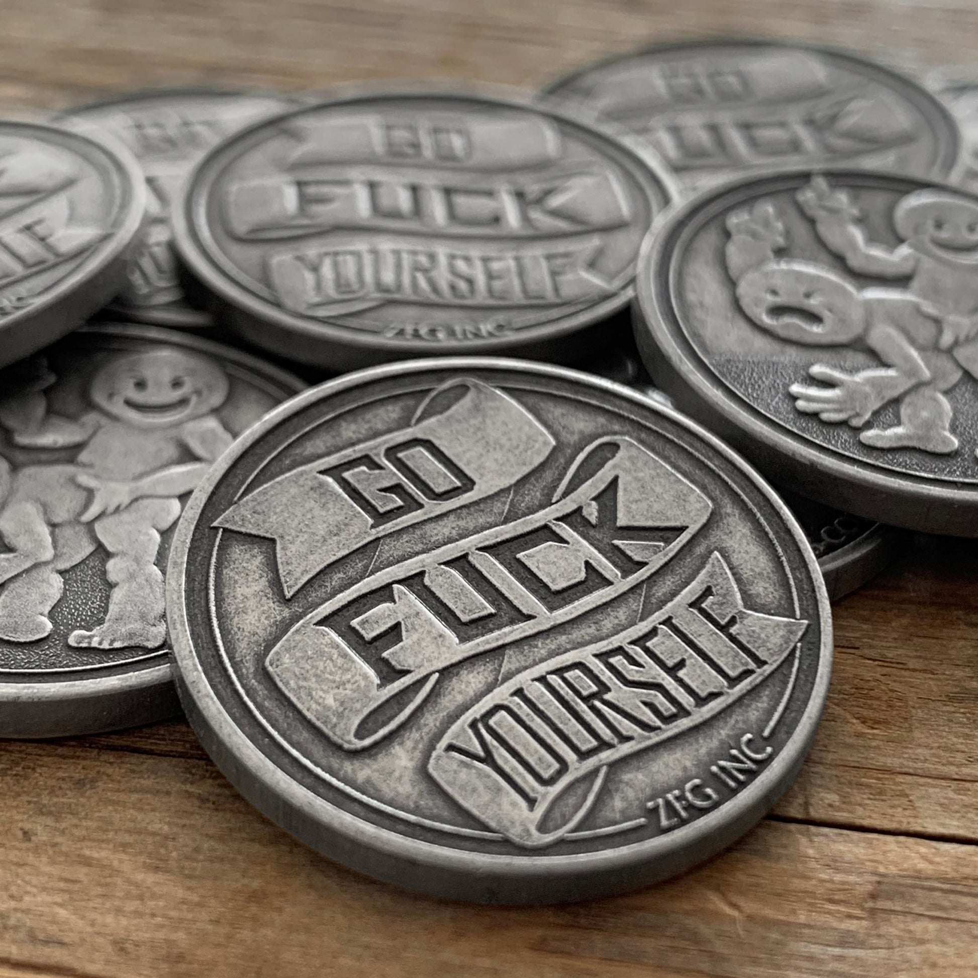 GFY Go Fuck Yourself Coins close up