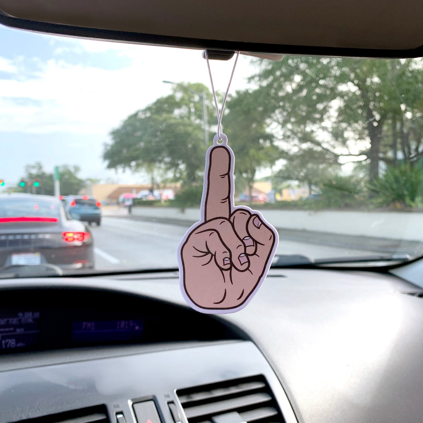 fuck you air freshener - middle finger - in car