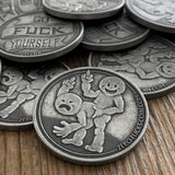 Stack of Go Fuck Yourself Coins getting fucked